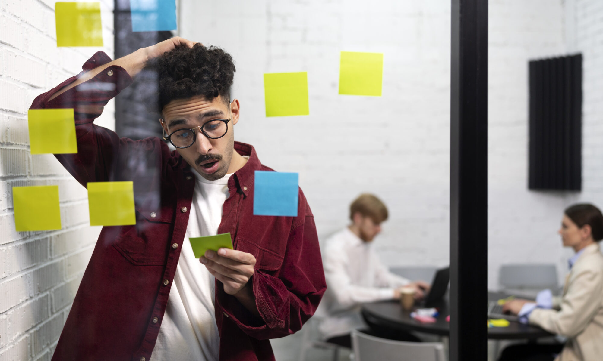 Medium Shot Man Holding Post It - RW Office