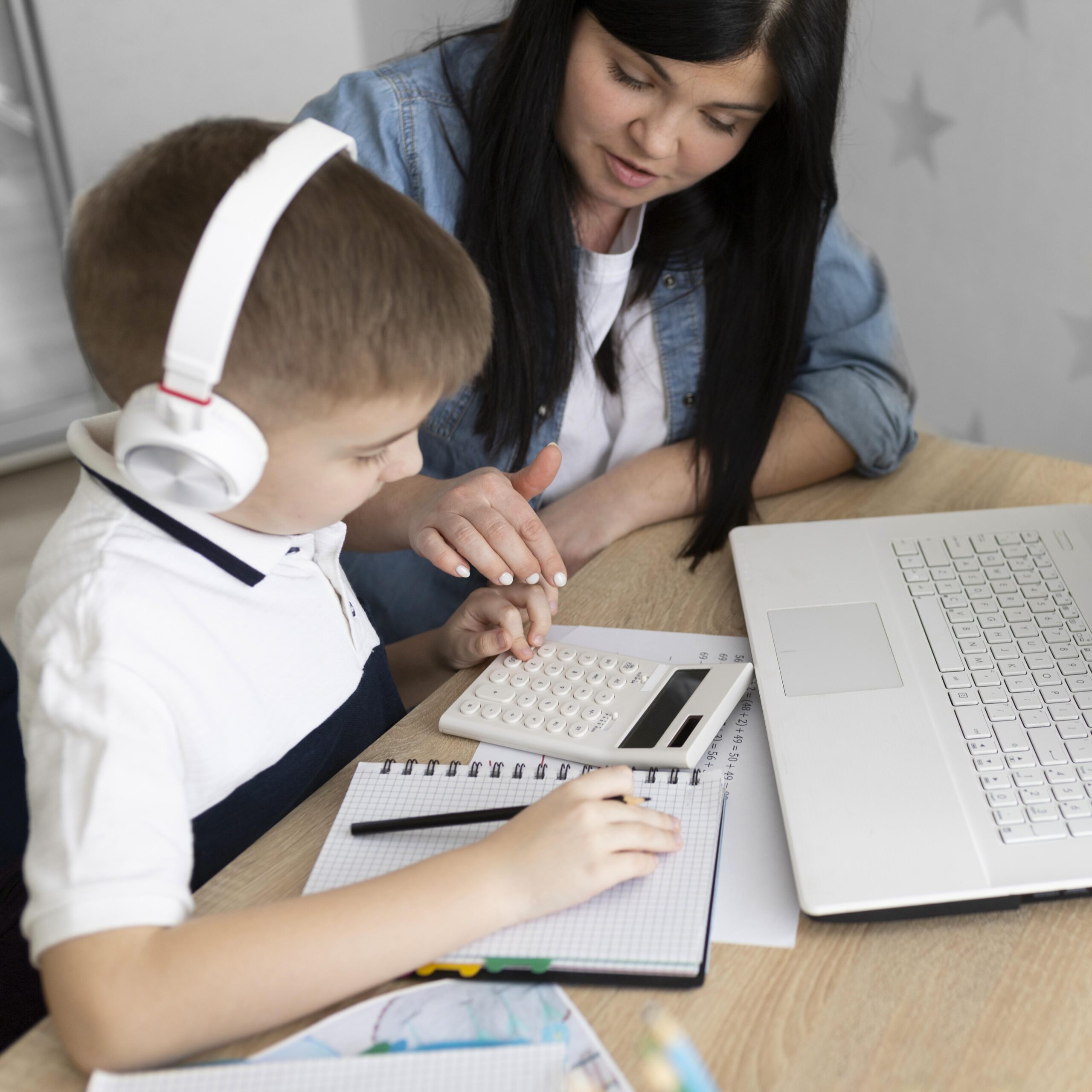 Close Up Woman Helping Kid With Doctor - RW Office