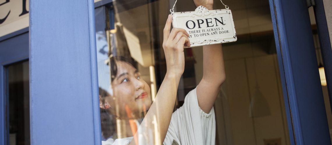 Young Woman Arranging Her Cake Shop - RW Office